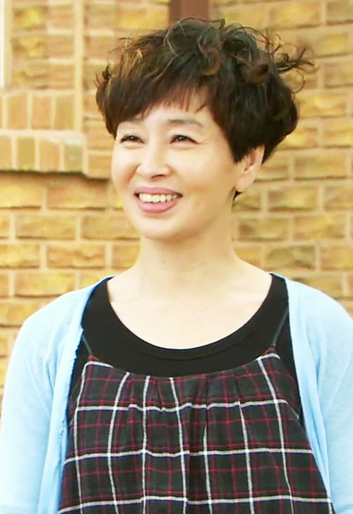 Lee Mi Young แสดงเป็น Kim Shin Ae